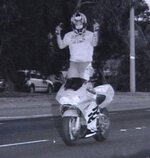 motorcycle-rider-standing-traffic-camera.jpg