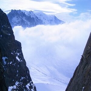 Cliffs, clouds, Mont Blanc